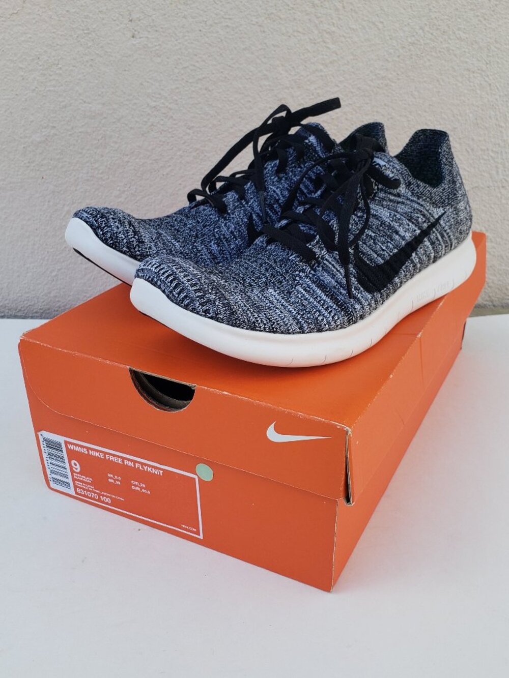 Nike Free RN Flyknit trainers in black and white